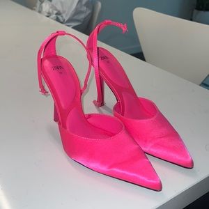 Neon pink pumps